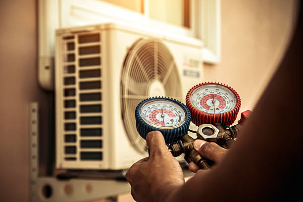Professional Air Conditioning Service technician working in Midlothian, VA